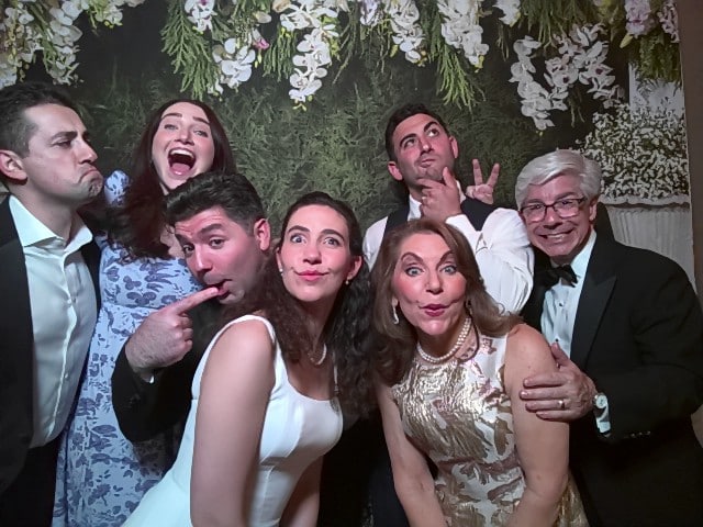 Philadelphia Photo Booth Rentals for Weddings, Mitzvahs & Parties 23 Bride and groom posing with family in a wedding photo booth in Philadelphia