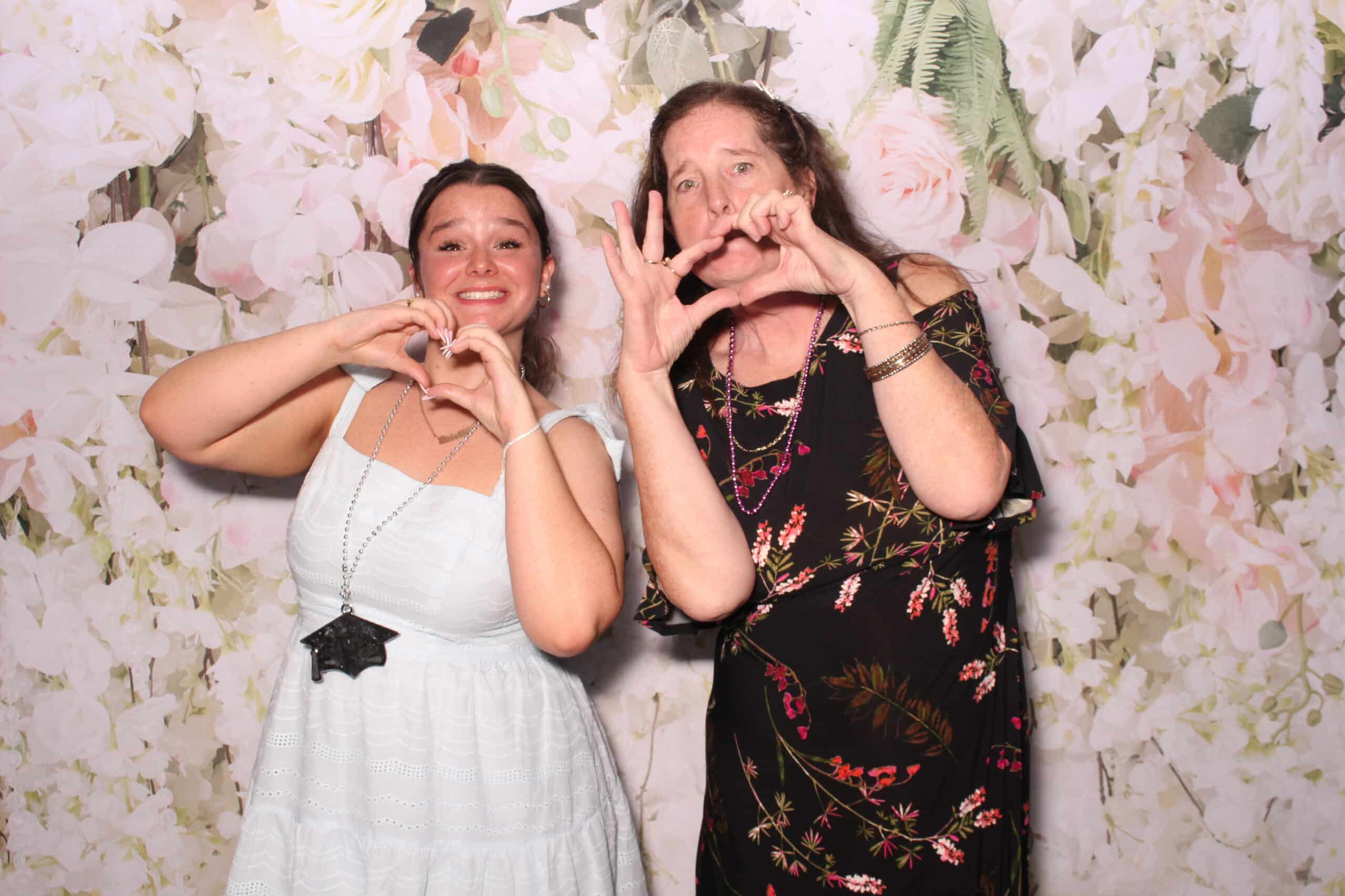 Philadelphia Photo Booth Rentals for Weddings, Mitzvahs & Parties 40 Bride and groom posing with family in a wedding photo booth in Philadelphia